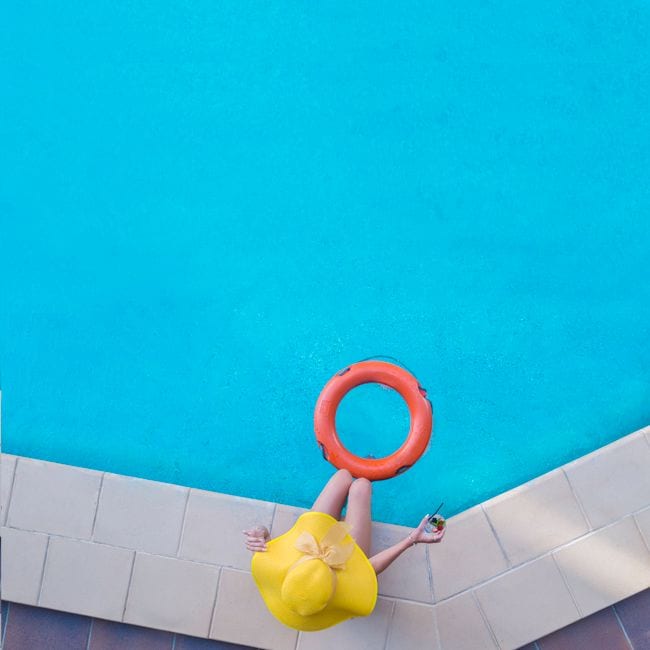 Sealed concrete pool surround with water-resistant finish