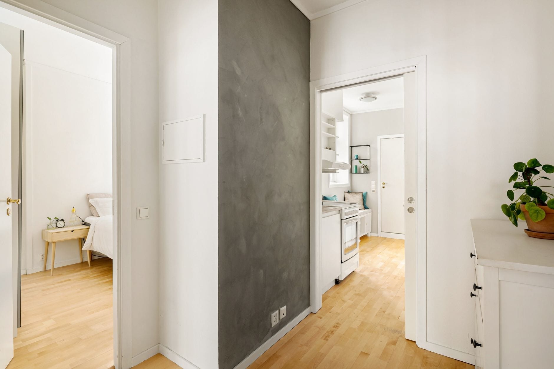 Skirting boards and corners being treated in a vacant rental