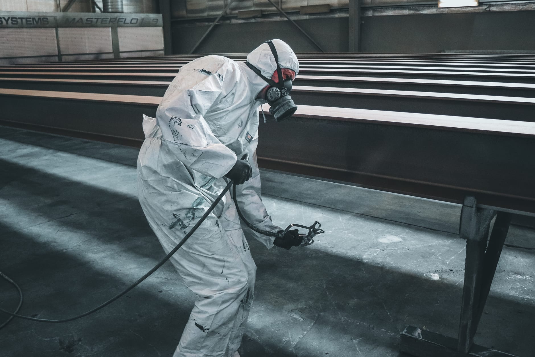 Industrial warehouse interior with newly painted walls and floor