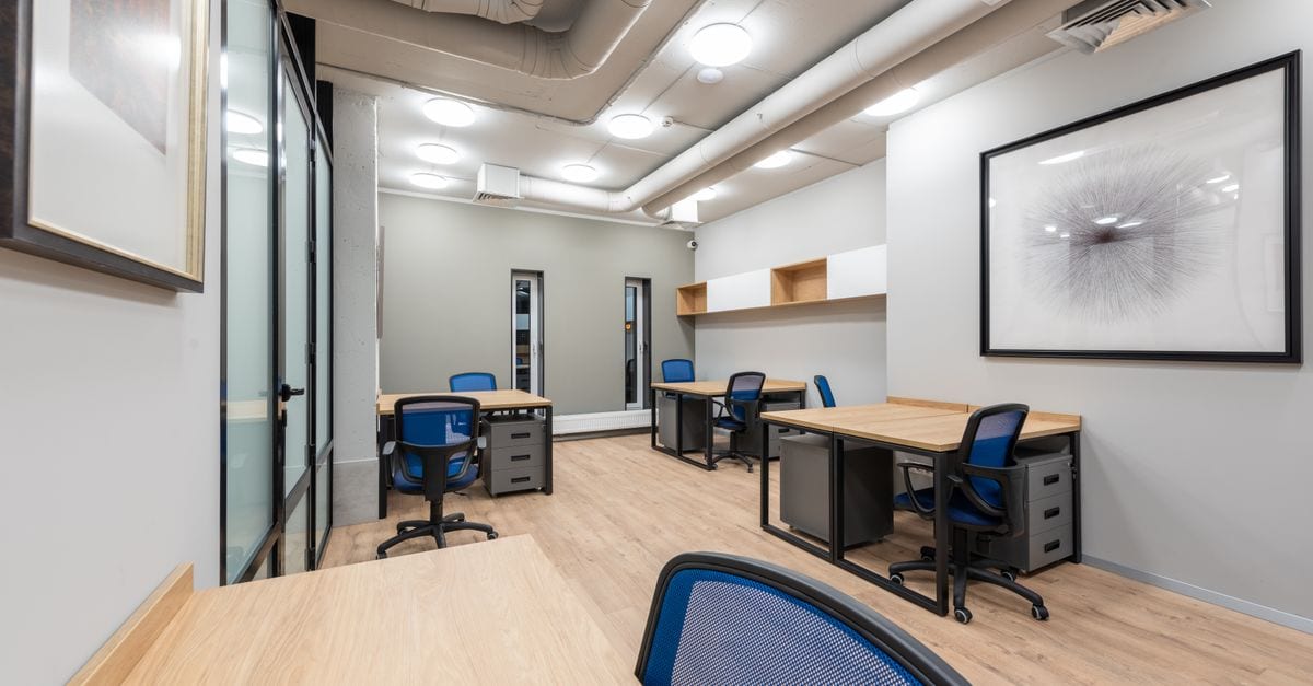 Painter working on the interior of a commercial office
