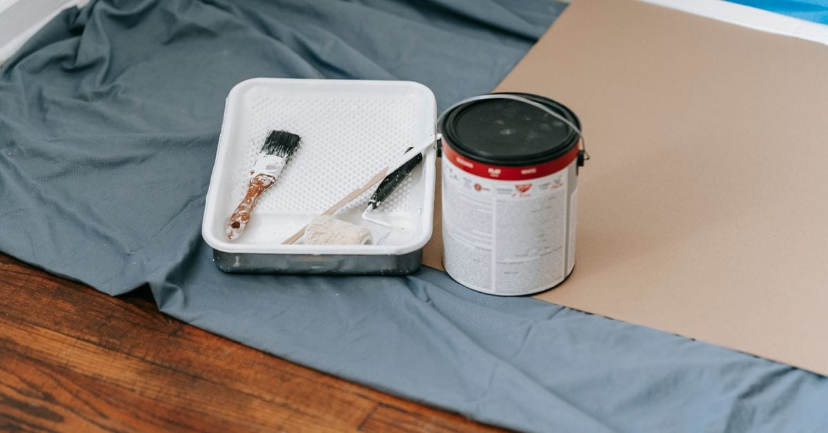 Paint tools and materials set up before a job.